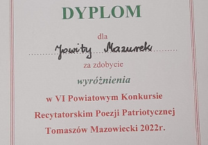 Dyplom - wyróżnienie dla Jowity Mazurek uczennicy klasy VIII