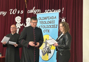 odebranie dyplomu za udział w finale olimpiady